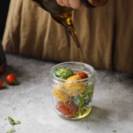 Turkuaz Kitchen Marinated Labneh Balls with Tomato Toast